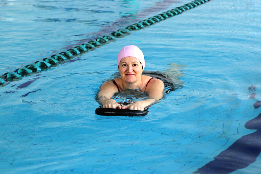 Middle Aged Woman in a swimming Pool